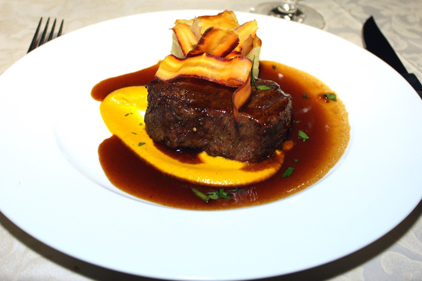 Grilled steak — representative of the cuisine, not a photo of any restaurant on this list